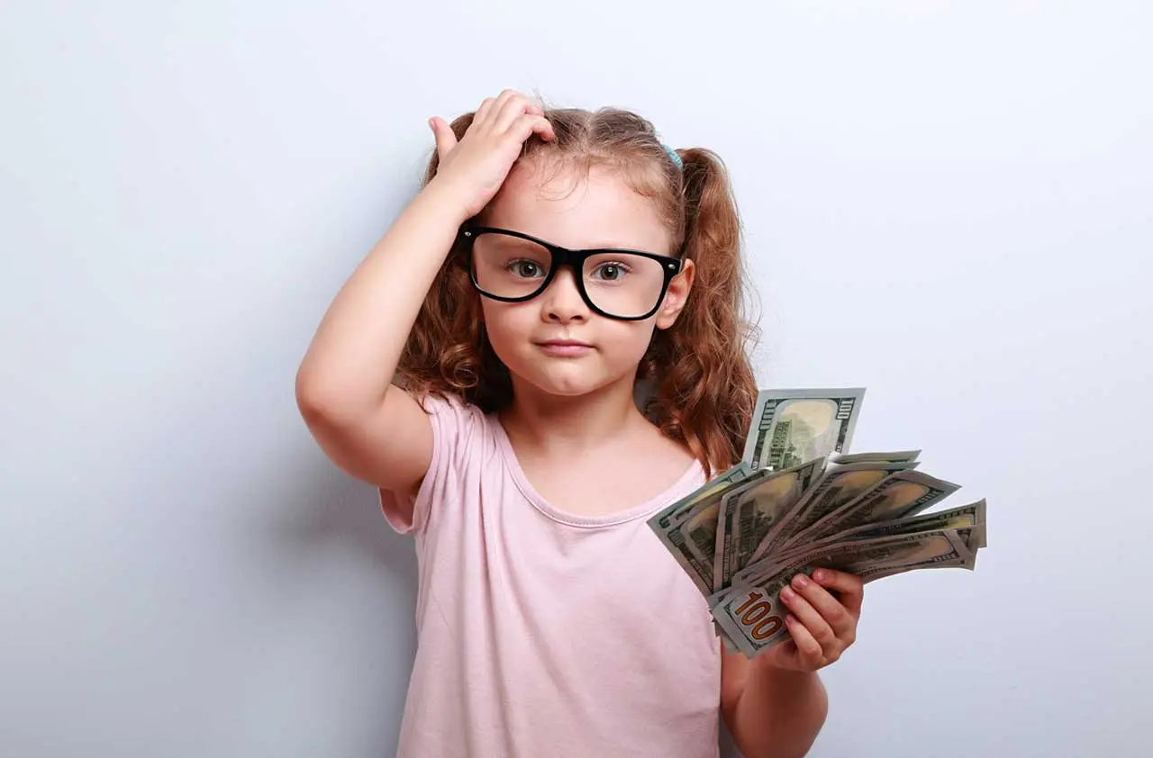 آموزش پول به کودکان: چطور به بچه‌ها سواد مالی یاد بدهیم؟